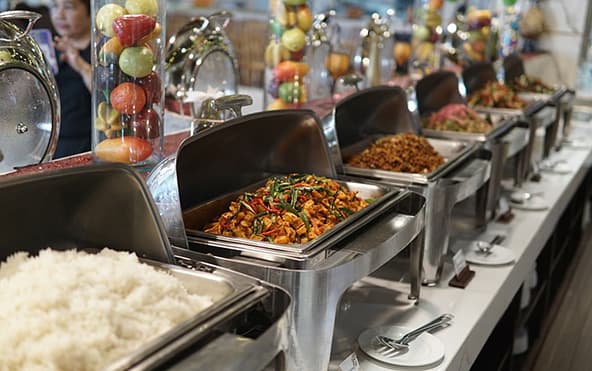 Premium special occasion catering buffet — chafing dishes with Bengali, multi-cuisine, and themed dishes by Parsha Caterer Kolkata